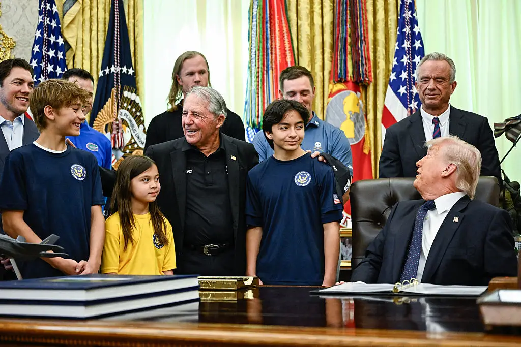 Donald Trump chatted to a young girl about her sporting aspirations (Kent NISHIMURA / AFP via Getty Images)
