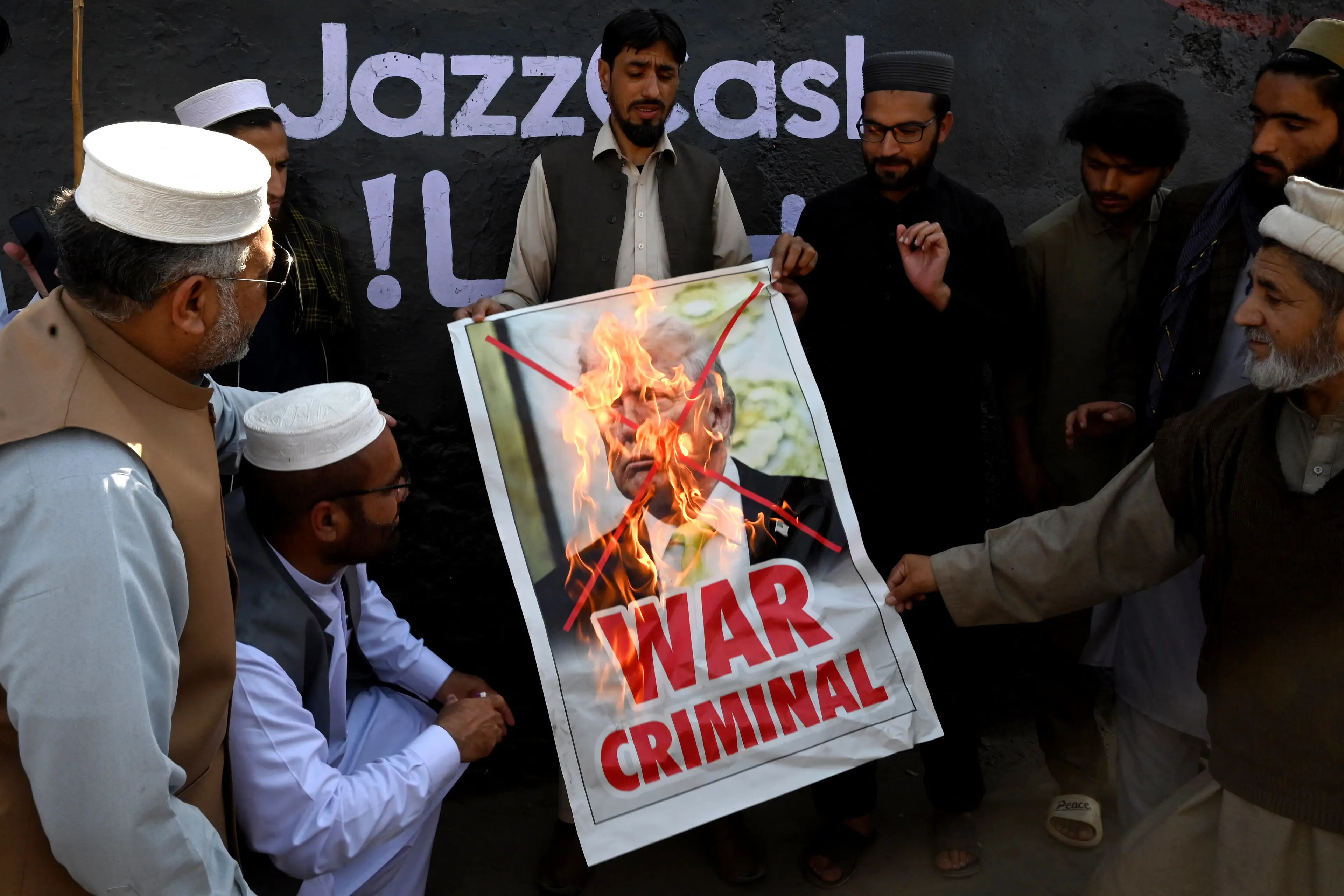 It's safe to say that opinions on Trump's war in the Middle East are significantly more negative (Abdul MAJEED / AFP via Getty Images)