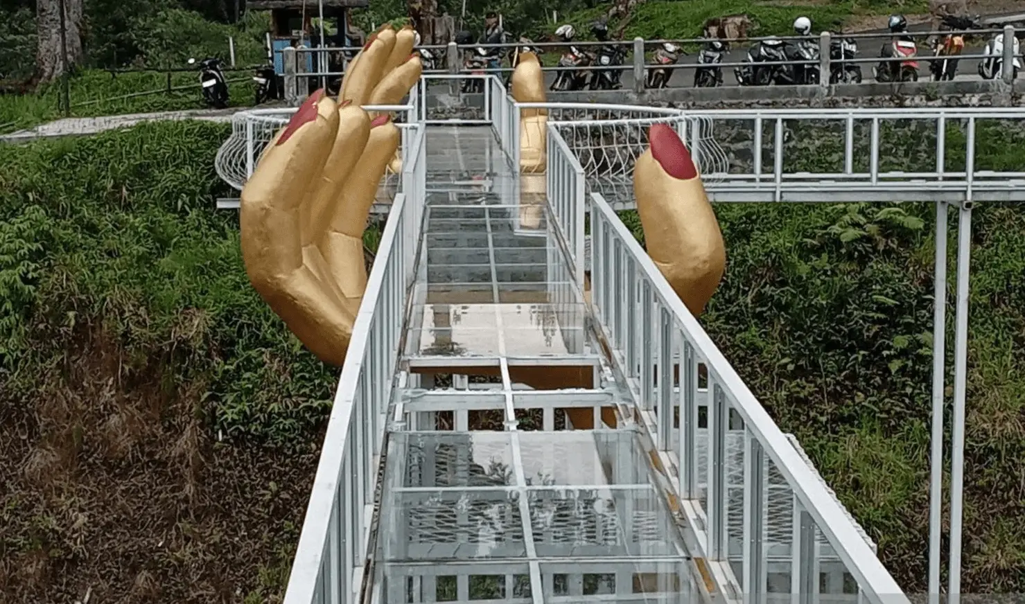 Glass panels from the bottom of the bridge shattered, causing tragedy.