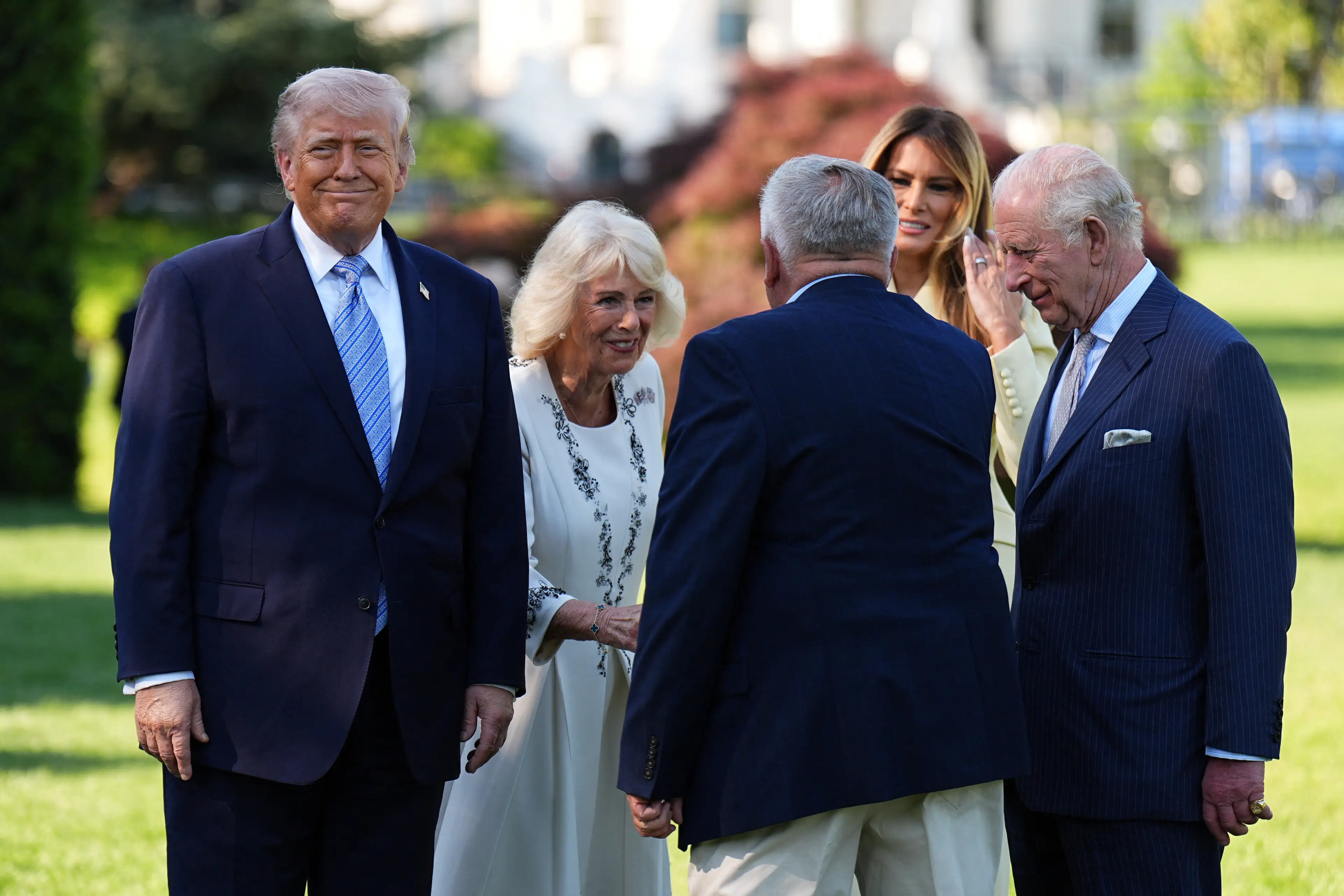 The couple appeared in high spirits as they met with President Trump and First Lady Melania (Aaron Chown / Getty Images)