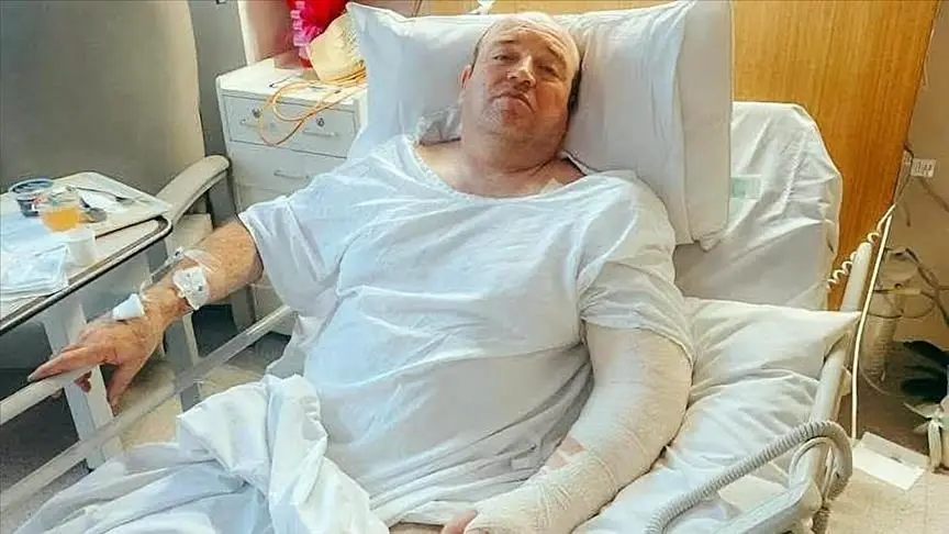 The man was hailed a hero after grappling the active shooter on Bondi Beach in December 2025. (YouTube/7 News Australia)