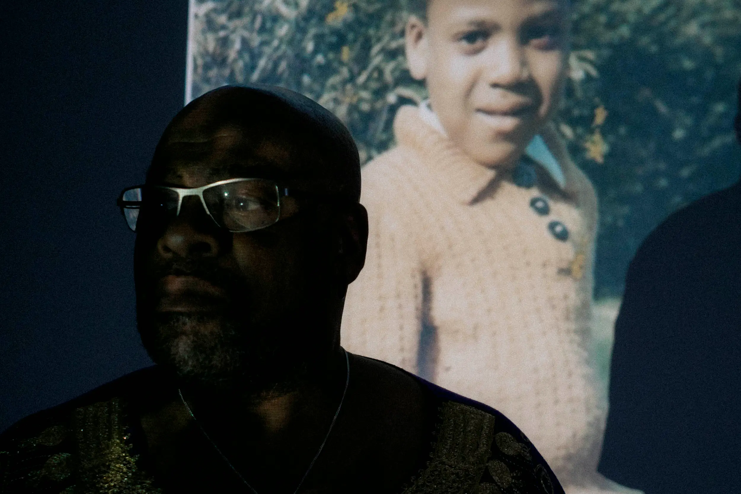 Gamal was raised by a white foster family.