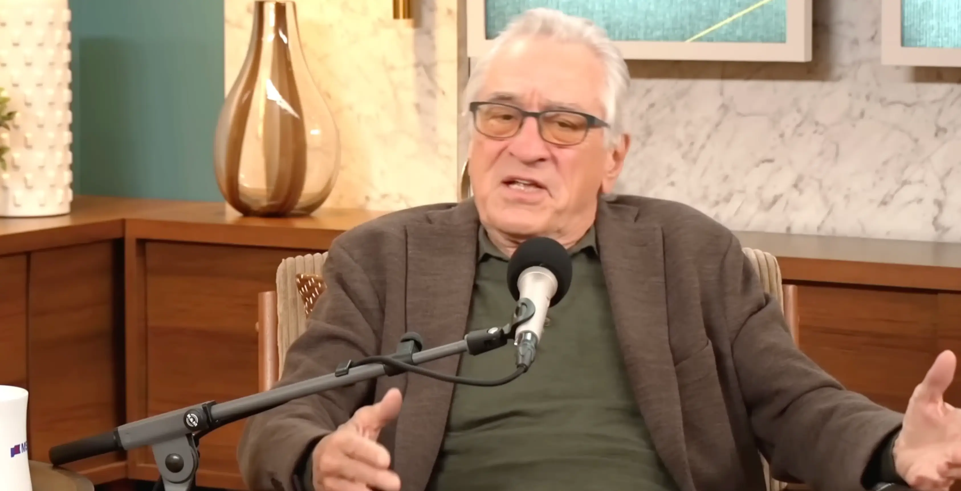 Robert De Niro appeared emotional at various points of the podcast (YouTube/MS Now)
