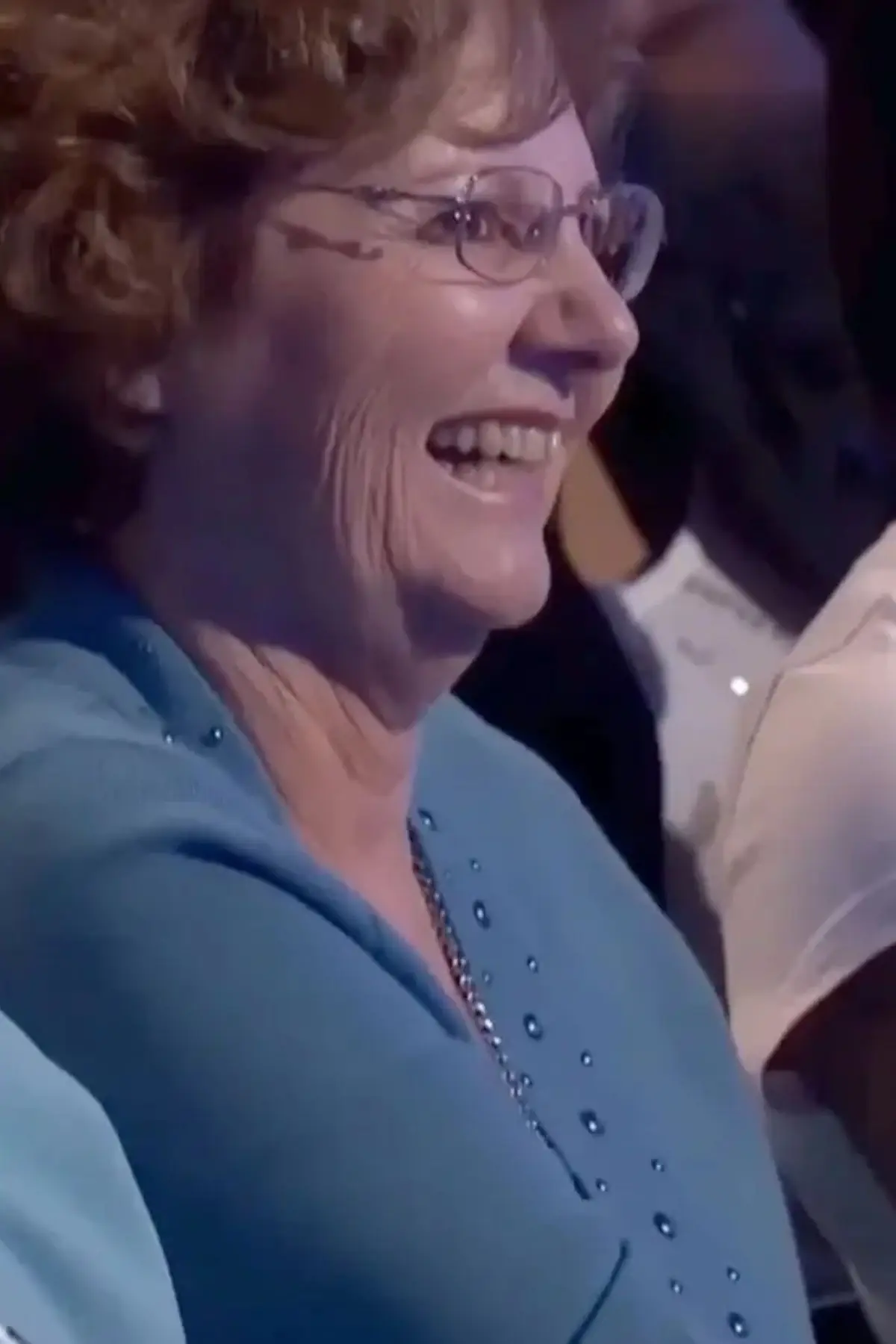 Cameras panned to a woman, who is thought to be the star's wife. (ABC/Family Feud)