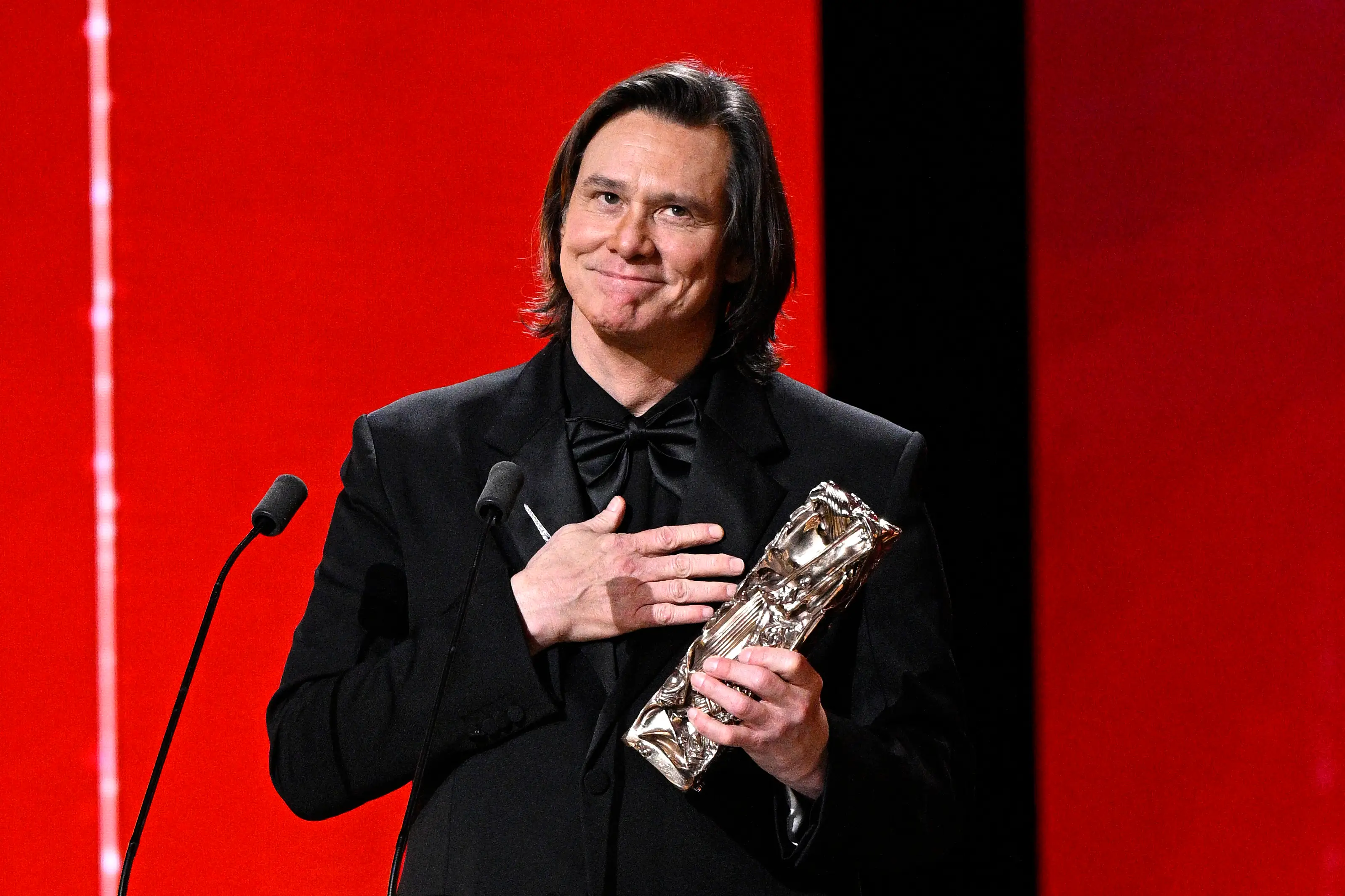 Carrey accepted the César award (Kristy Sparow/Getty Images)