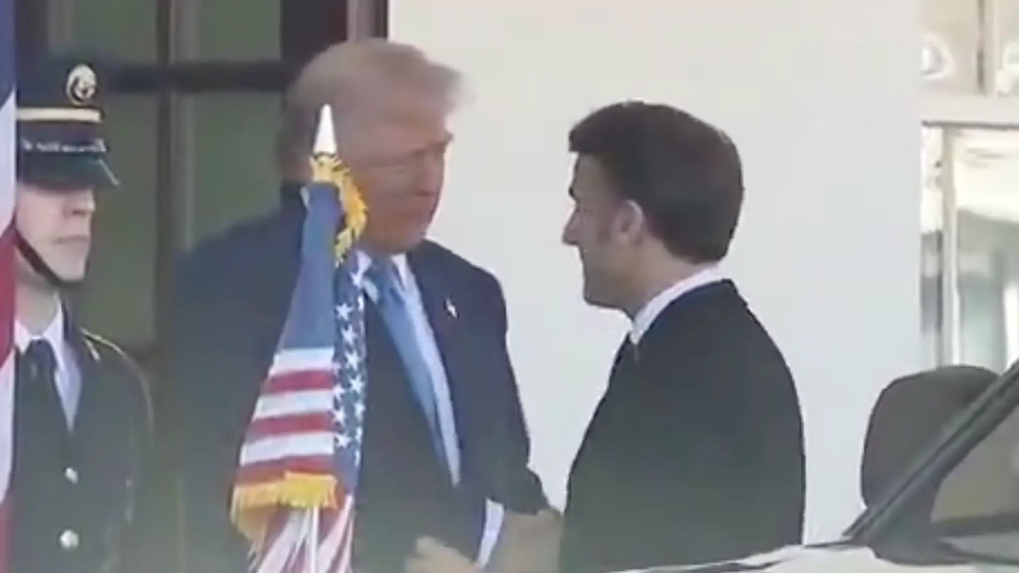 Body language expert breaks down Donald Trump and French President's attempt to 'assert power' during awkward handshake