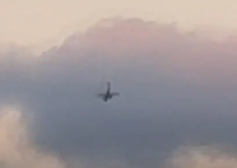 The plane settled in the home and backyard after crashing to the ground.