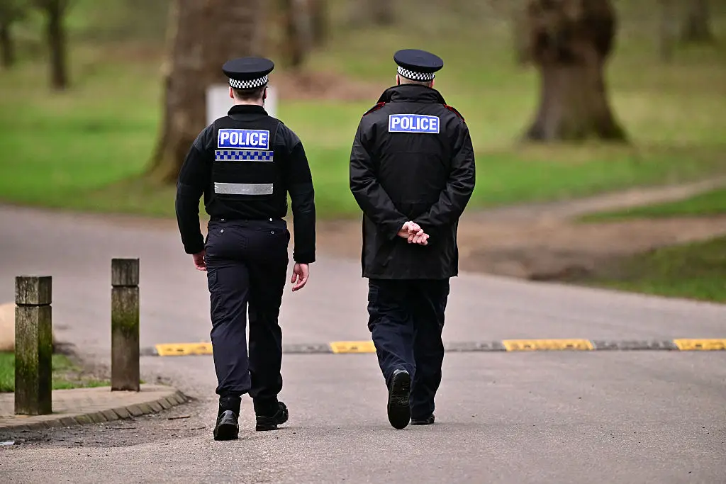 Police spoke to those at the scene on Thursday (Ben STANSALL / AFP via Getty Images)
