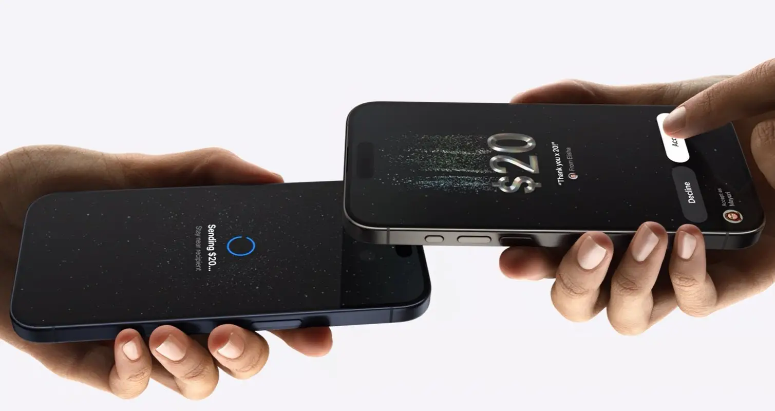 The feature will allows users to tap their phones to send money. (Apple)