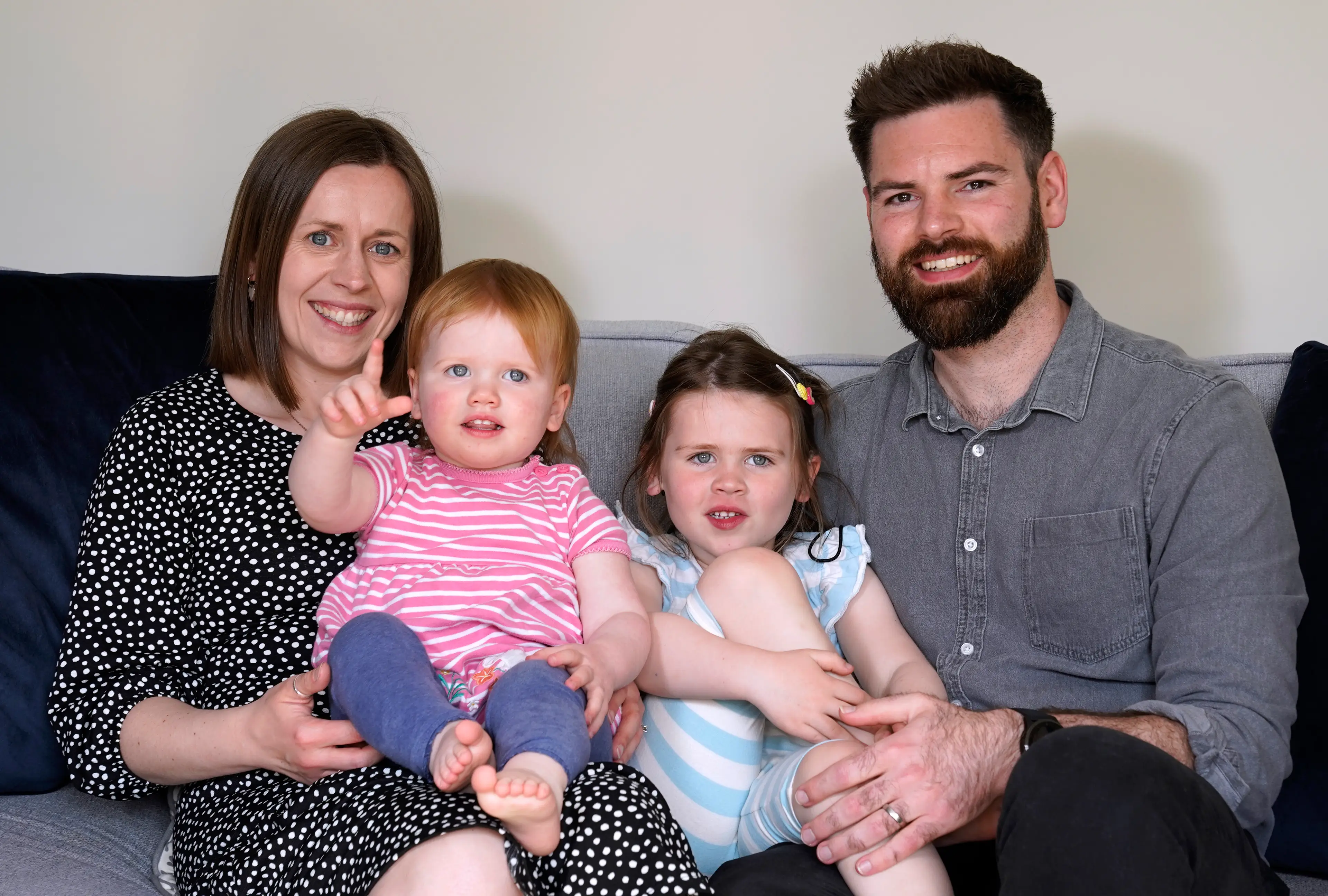 Opal Sandy, pictured with her parents and big sister, was born completely deaf. (PA News Agency)