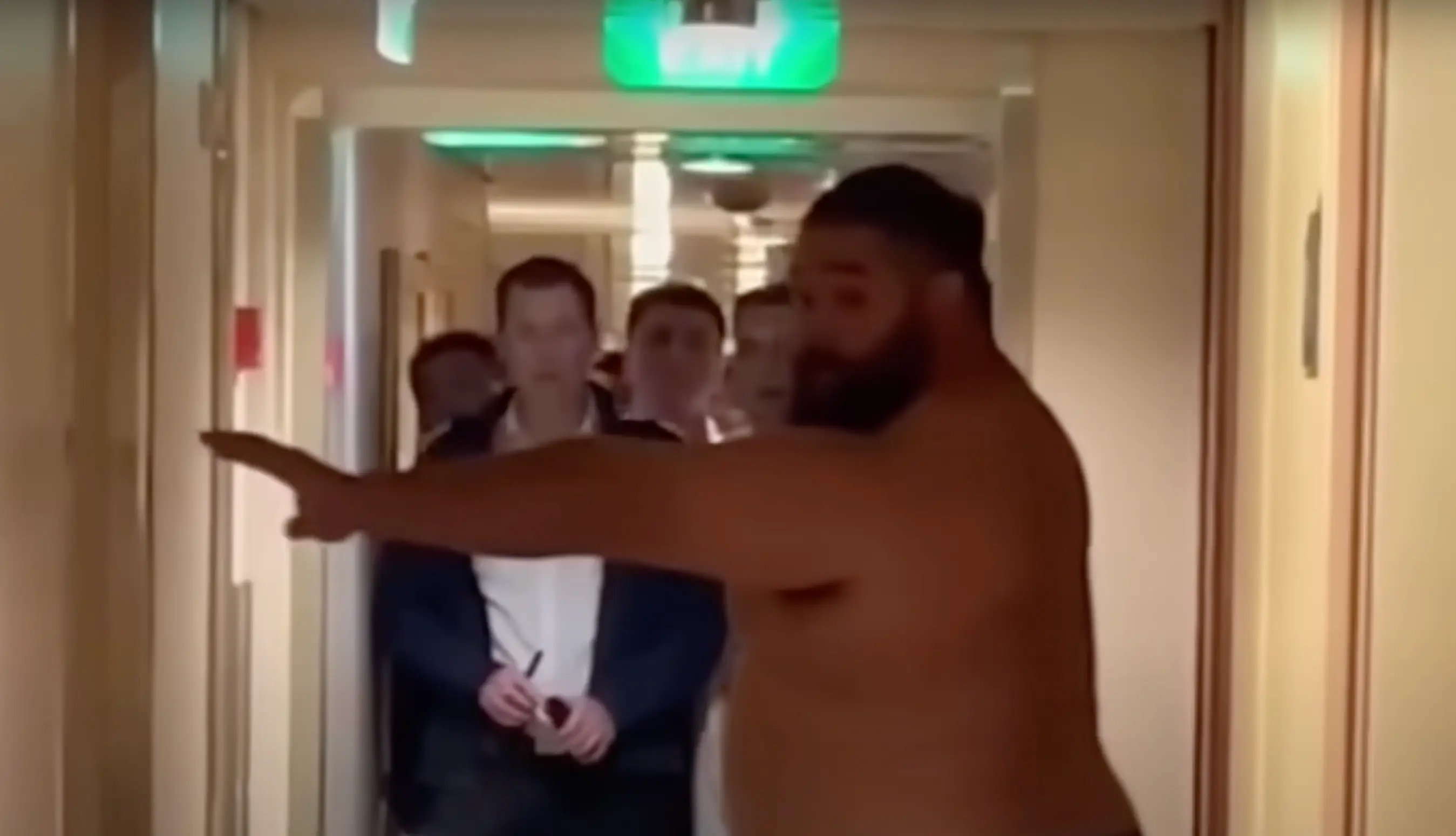 Michael Virgil is seen taking his top off in the recording taken by eyewitness Christian Mikhail (FOX 11 Los Angeles)