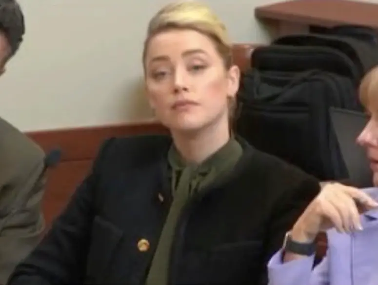 Heard says the picture is photoshopped.