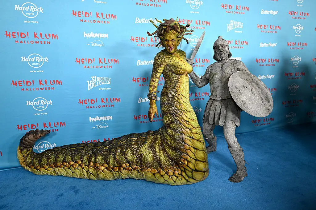 Klum dressed as Medusa for last year's party, while her husband, Tom Kaulitz, went as a concrete soldier. (Photo by Noam Galai/Getty Images for Heidi Klum Halloween)