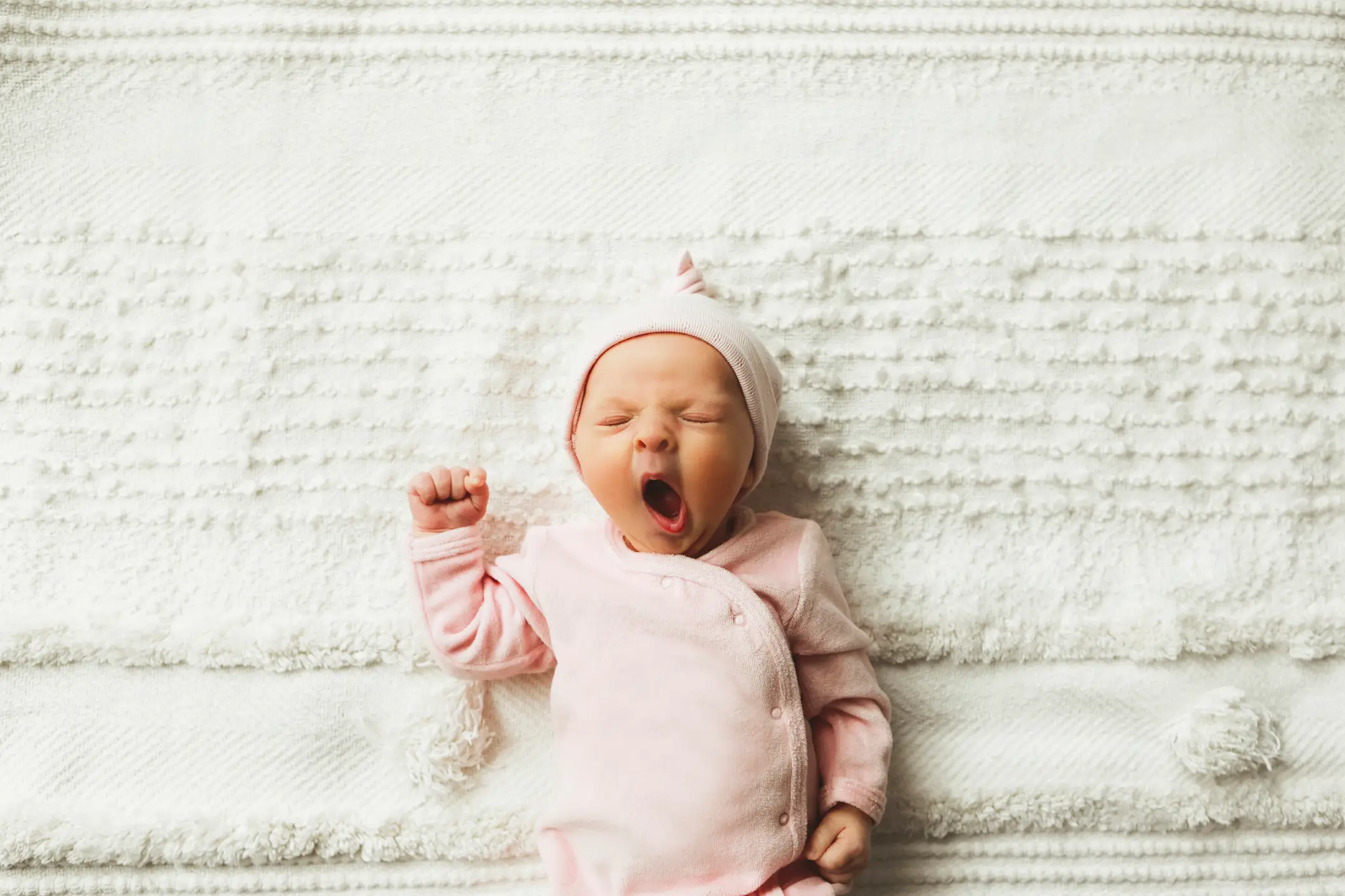 Newborn babies are safest sleeping on a flat surface on their backs, says the AAP (Getty Stock Image)
