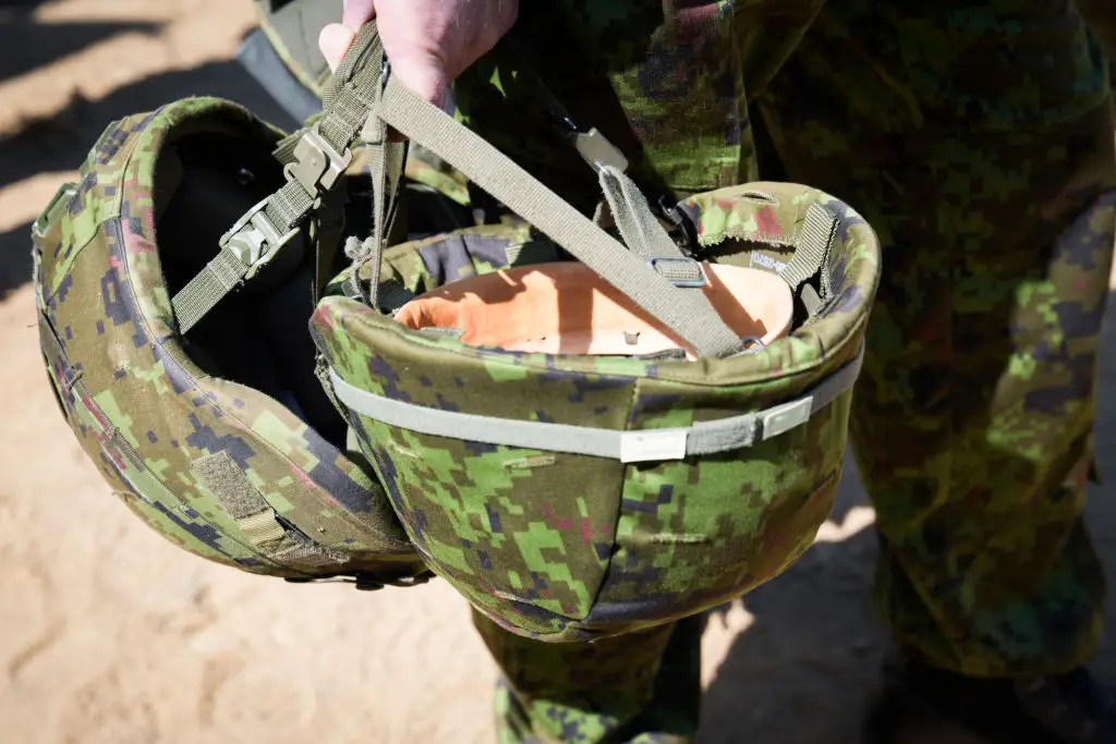 The men were alternating wearing a kevlar helmet (Jaap Arriens/NurPhoto via Getty Images)