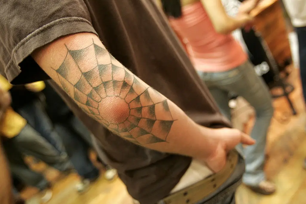 A cobweb design, meanwhile, is generally used to represent a lengthy prison sentence, drawing on the imagery of a spider trapping its prey, or a person effectively trapped behind bars. (Photo by Chris Weeks/WireImage)