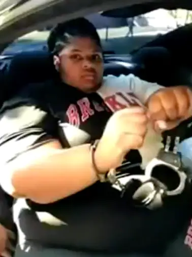 Former security specialist Mary Moore is accused of having 'improper physical contact with another inmate'.