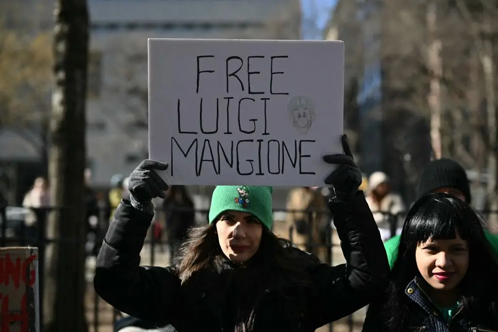Hundreds of Mangione's supporters turned up to court (ANGELA WEISS/AFP via Getty Images)