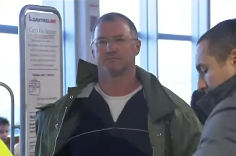 Graham Potter prior to going on the run (ABC News Australia/YouTube)