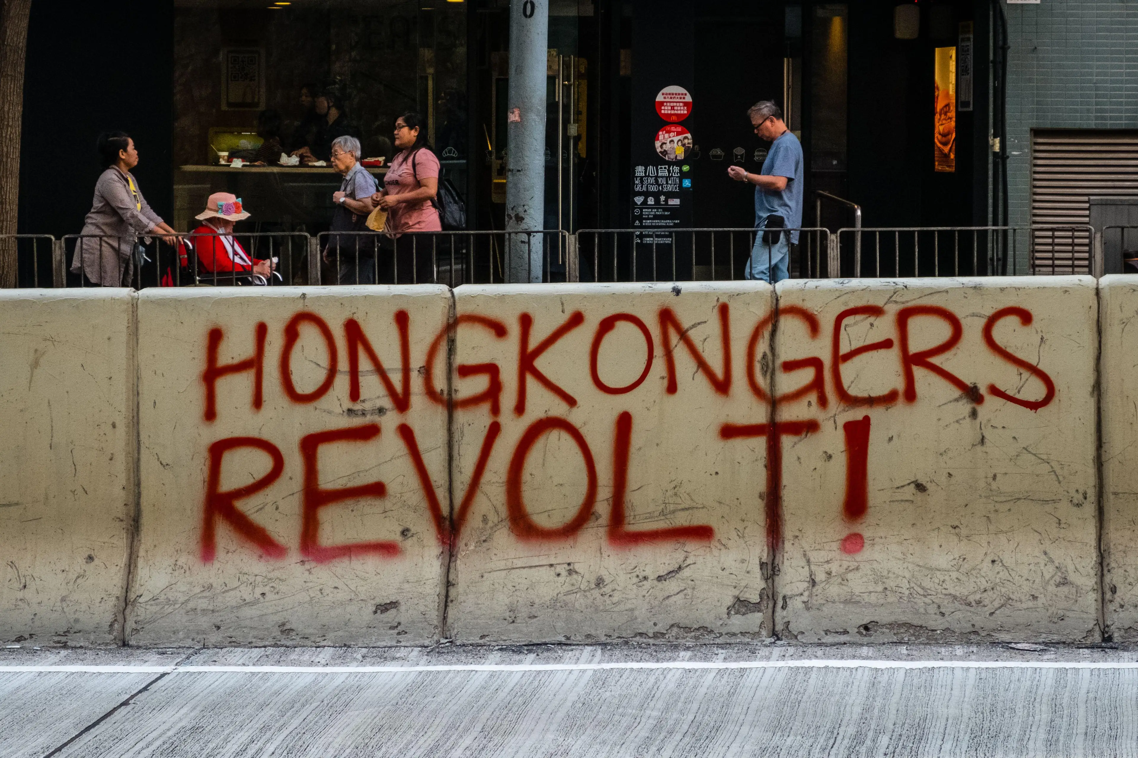 A man who attacked four people during the 2019 Hong Kong protests has been sentenced to prison.