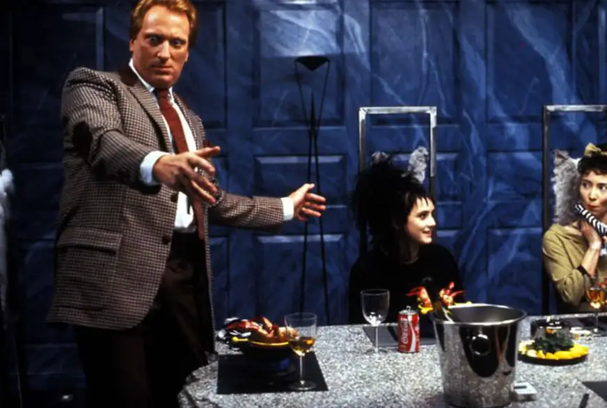 Jeffrey Jones in the first Beetlejuice film in 1988 alongside Winona Ryder (Warner Bros.)