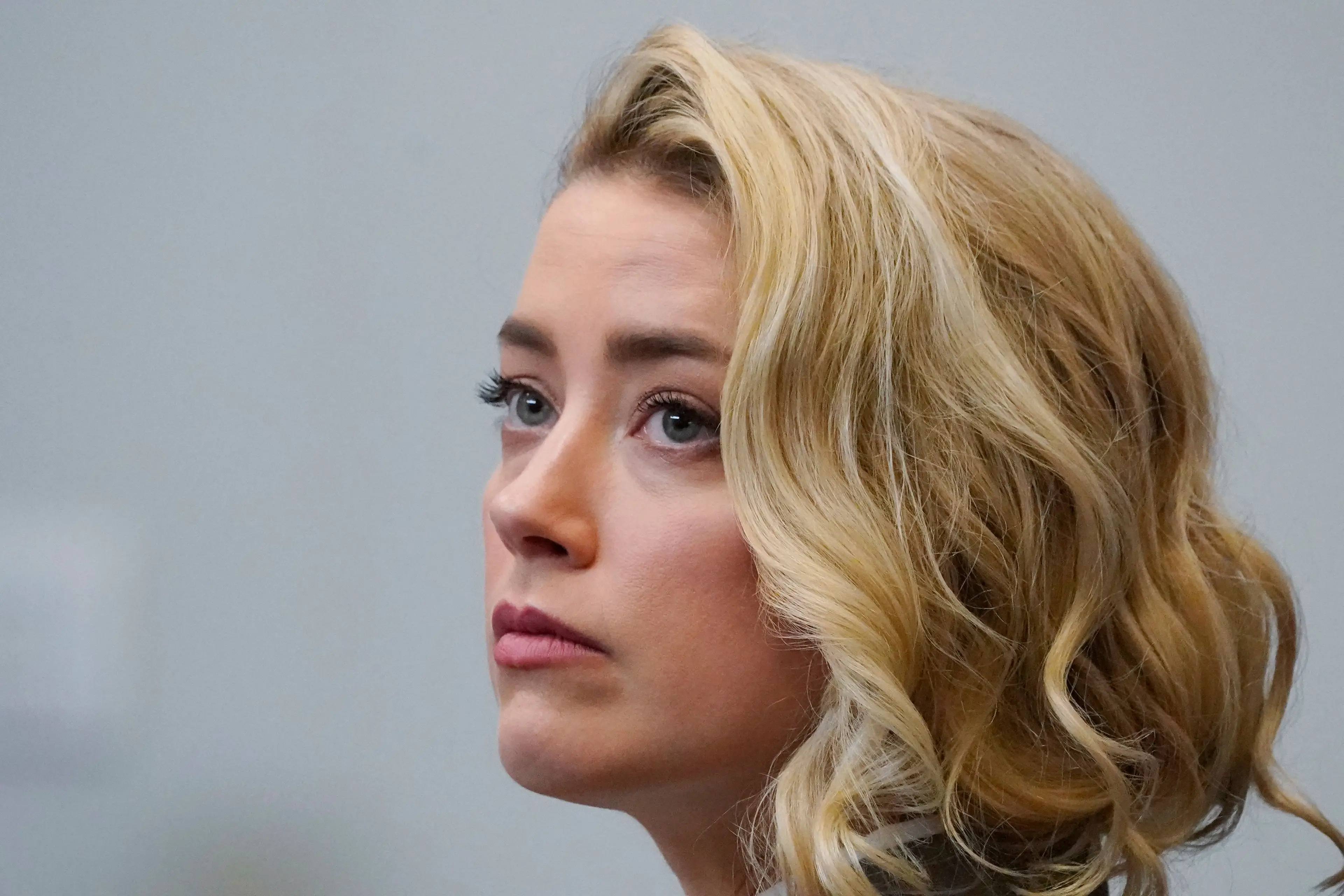 Amber Heard was locked in a legal battle with Johnny Depp (STEVE HELBER/POOL/AFP via Getty Images)