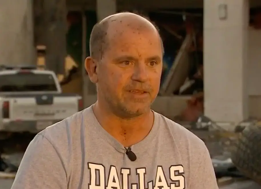 Chris Tuveng survived a tornado (WFAA/ YouTube)