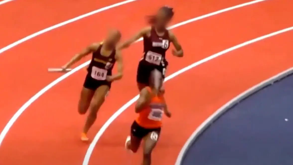 Horrifying footage shows moment runner is 'attacked' with baton by opponent during major race