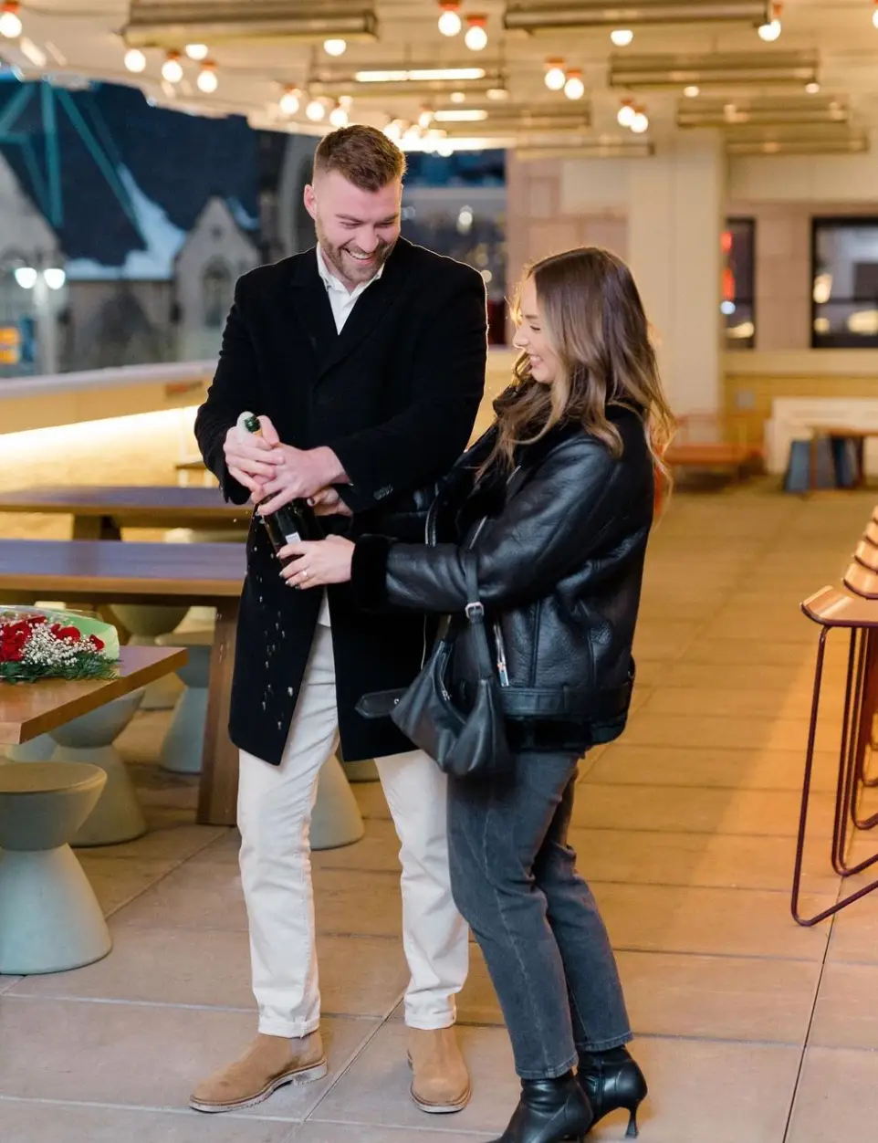 McClintock and Mathers popped some champagne after the proposal.