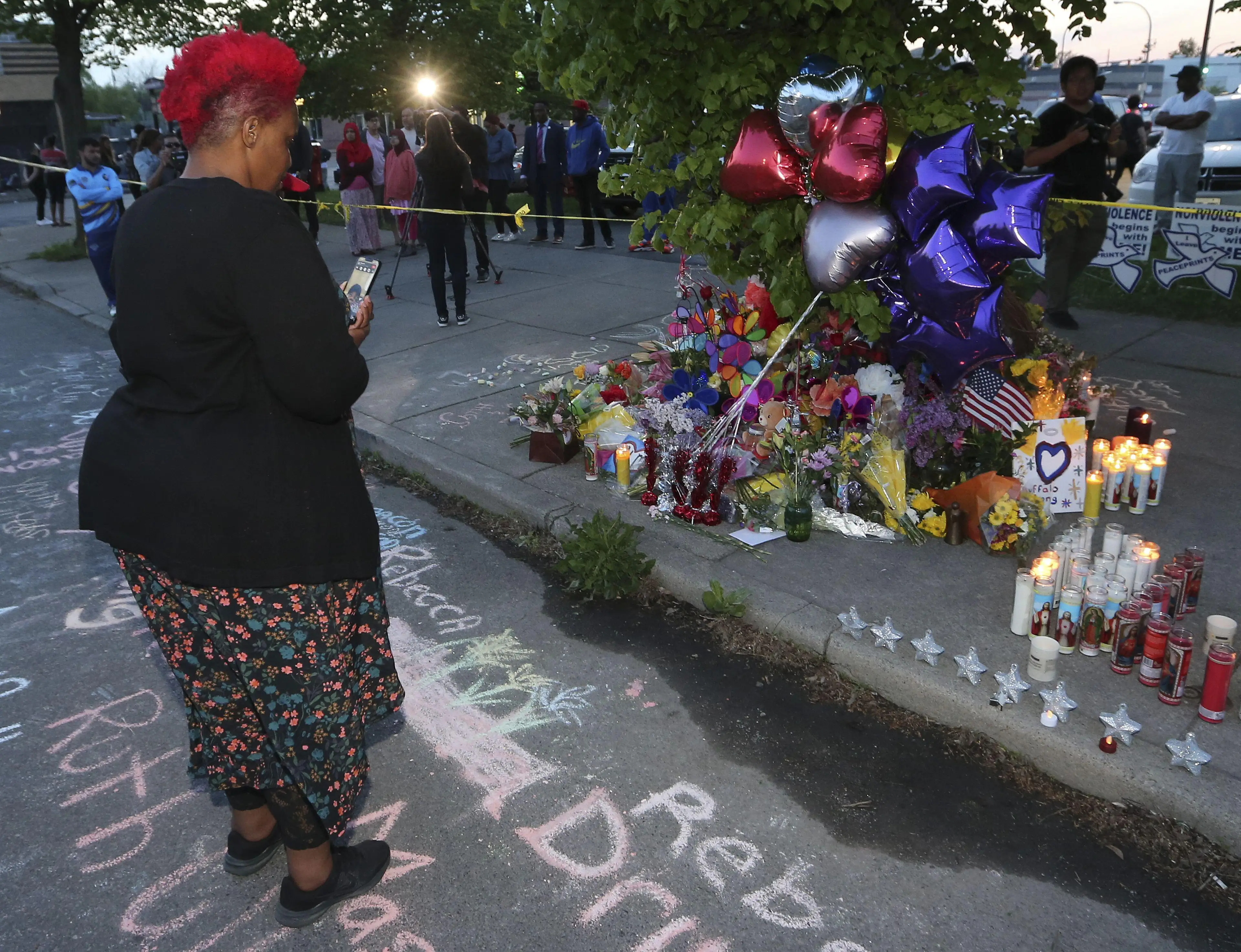 A woman at the memorial in Buffalo, New York.