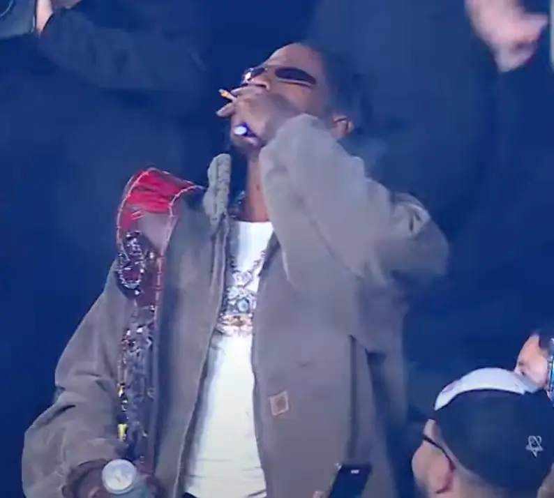 The rapper appeared to smoke a joint as he escorted Jay Uso (WWE/Netflix)