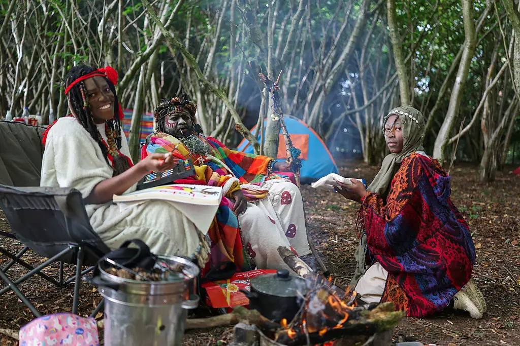 The 21-year-old is a 'handmaiden' to the self-proclaimed king and queen (Jeff J Mitchell/Getty Images)