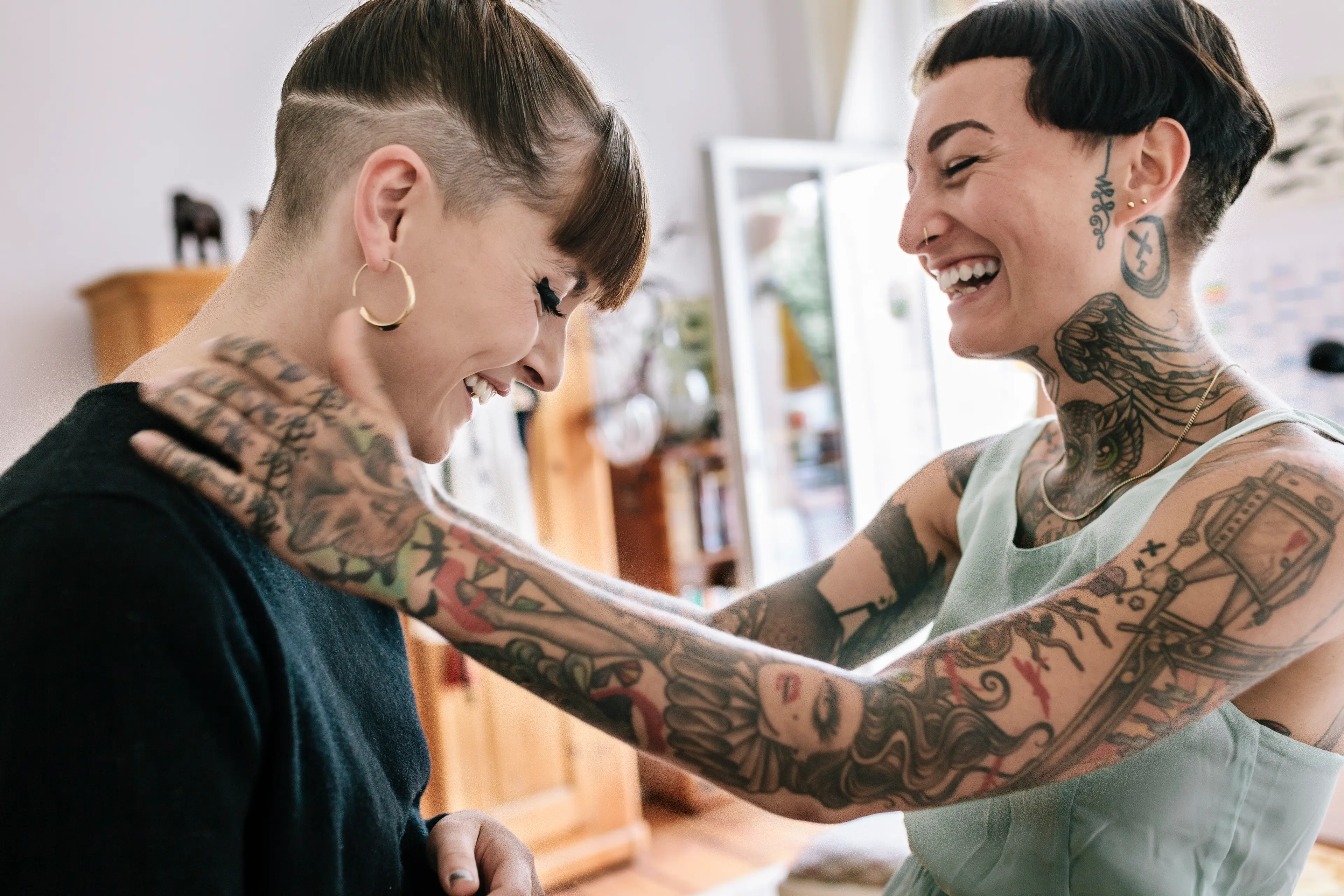 The twin with tattoos may have a slightly higher risk of developing skin cancer (Getty Stock Image)