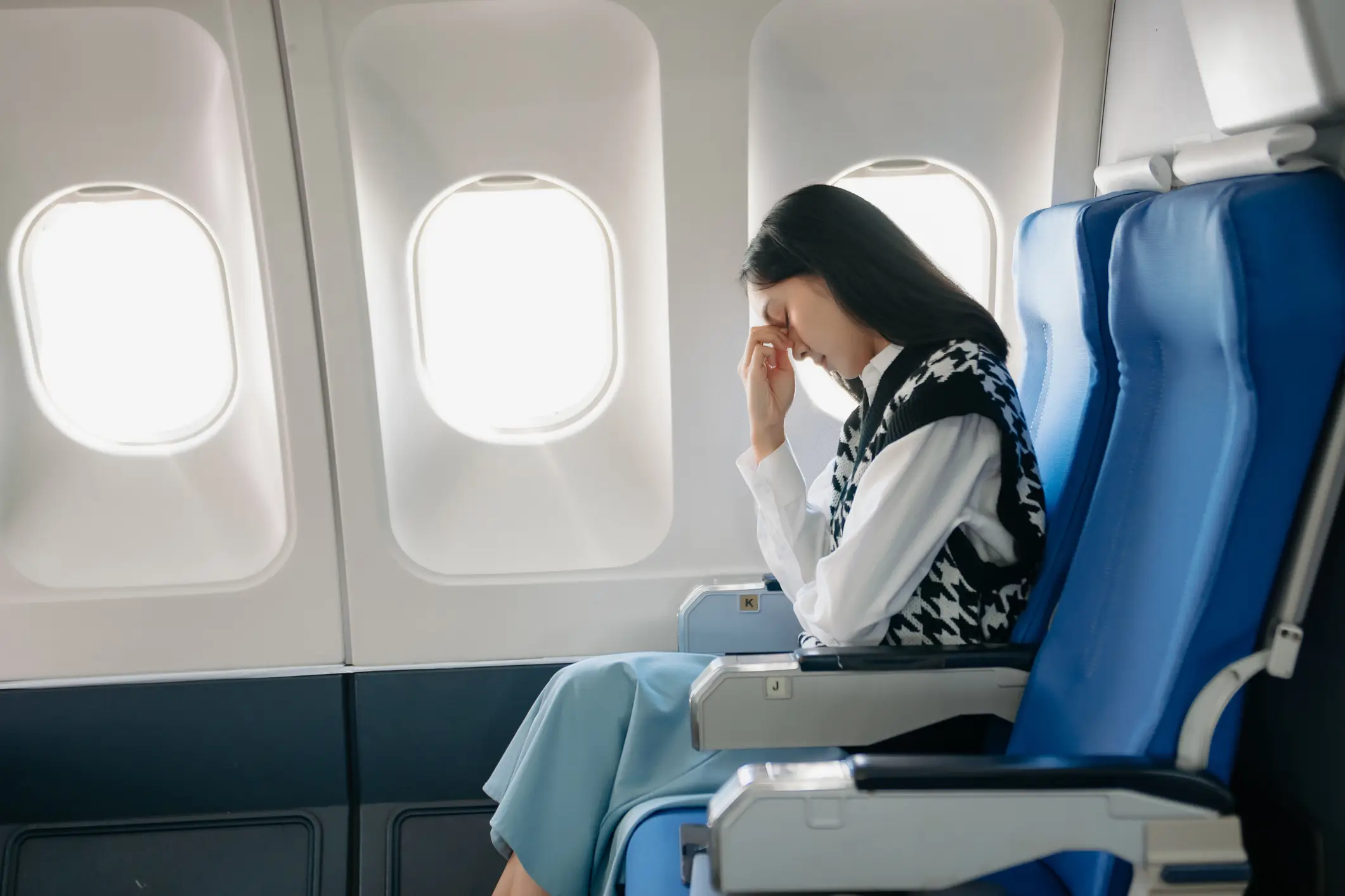 A woman has created chaos online after complaining about a fellow plane passenger (Laddawan Punna /Getty stock images)