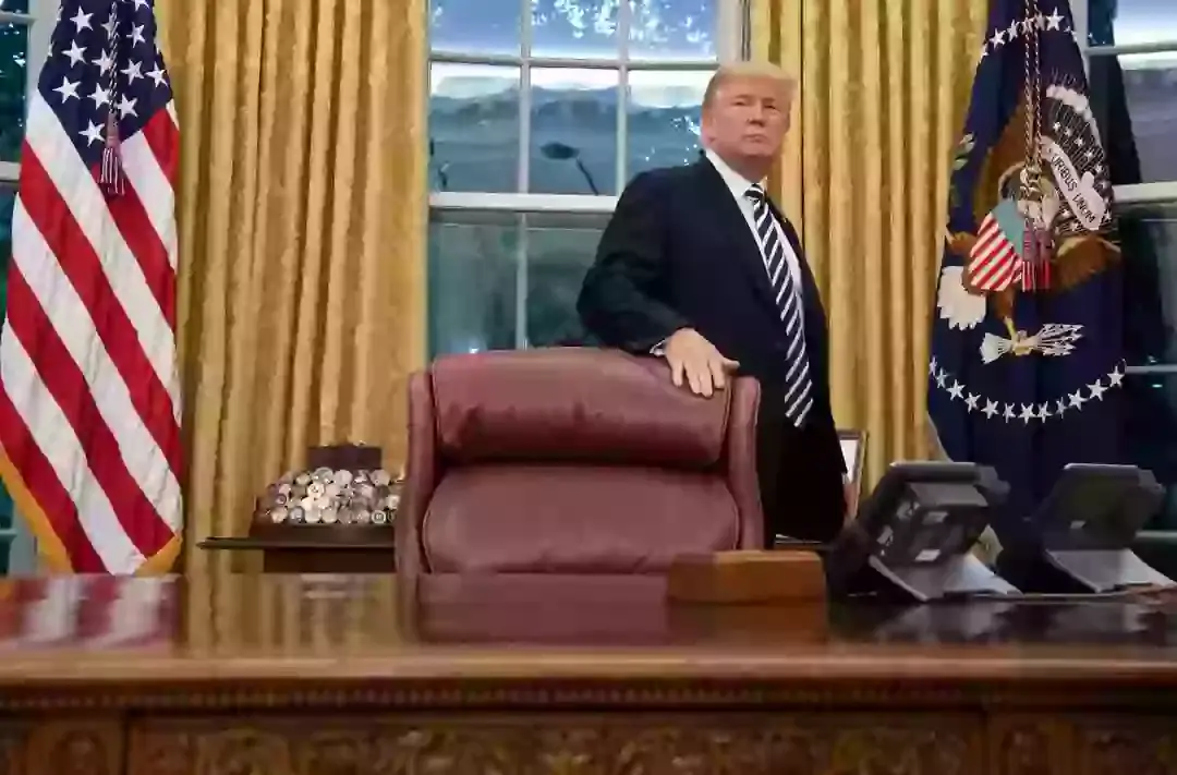 The red button sits on the Oval Office's Resolute Desk (SAUL LOEB/AFP via Getty Images)