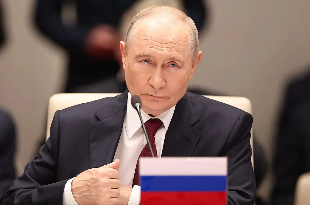 Russian Prime Minister Vladimir Putin had a chilling response when asked whether he would target the UK (Peter KOVALEV / POOL / AFP via Getty Images)