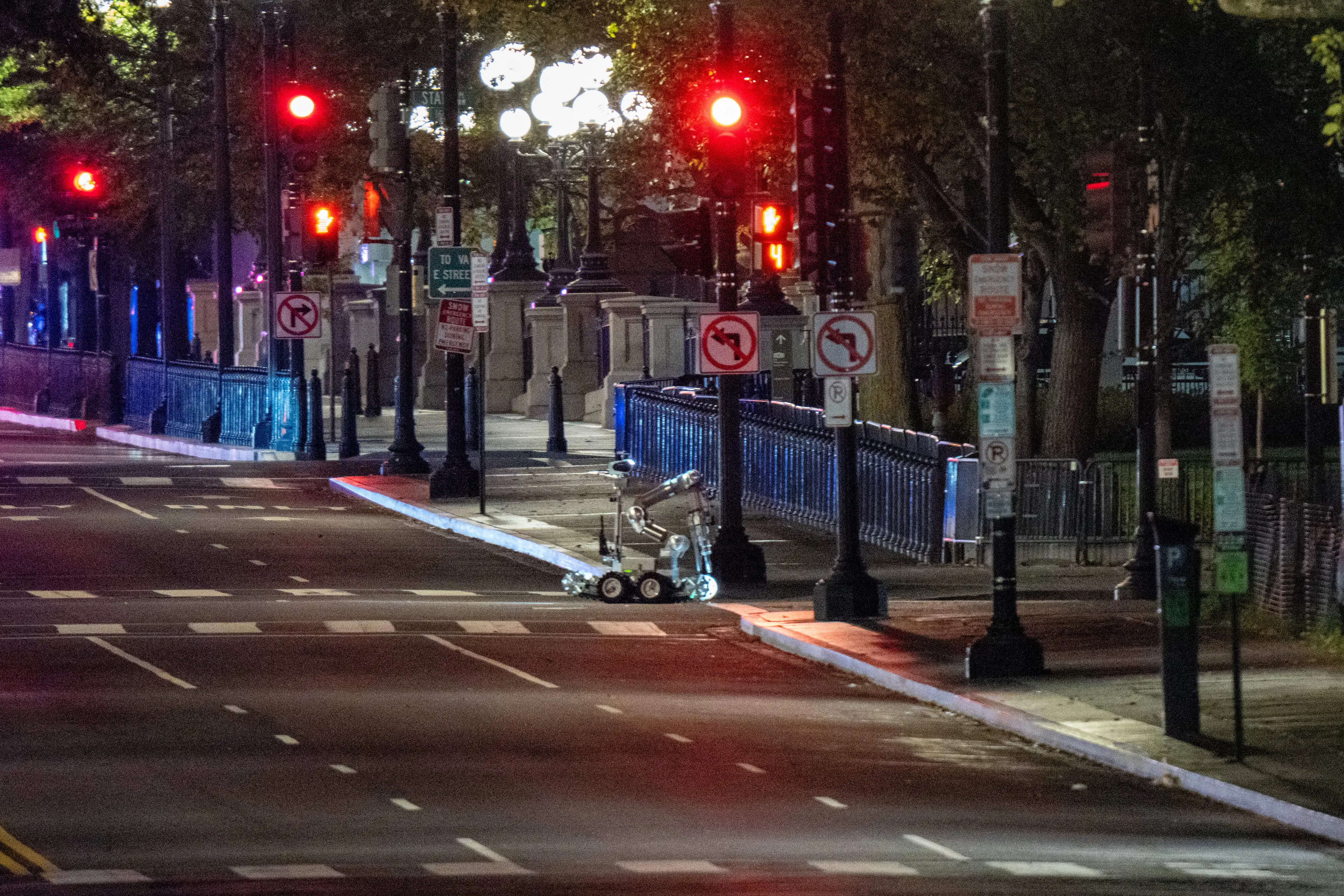 A bomb detection robot inspecting the scene (Andrew Leyden/Getty Images)