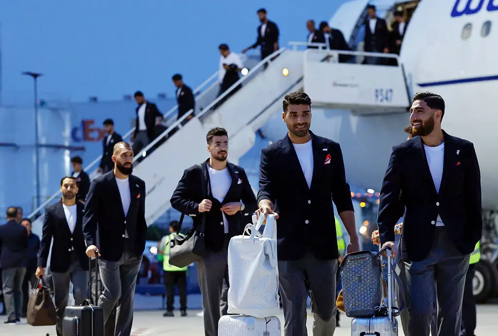 Players wore the badges as they landed in Mexico on Sunday (June 7). (Mario Tama/Getty Images)
