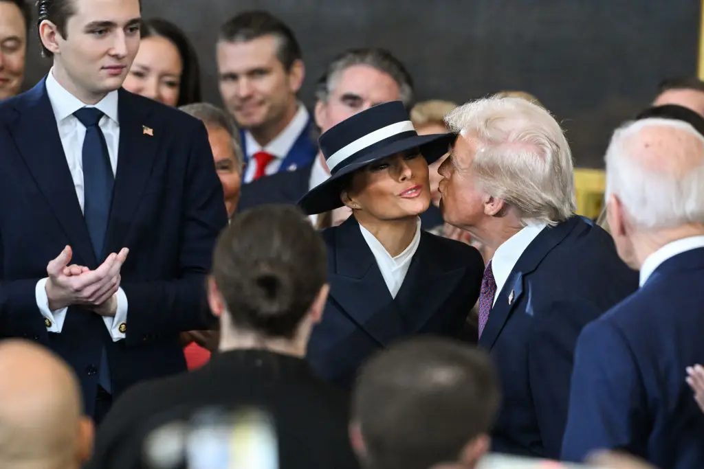 The couple didn't touch lips (Saul Loeb - Pool/Getty Images)