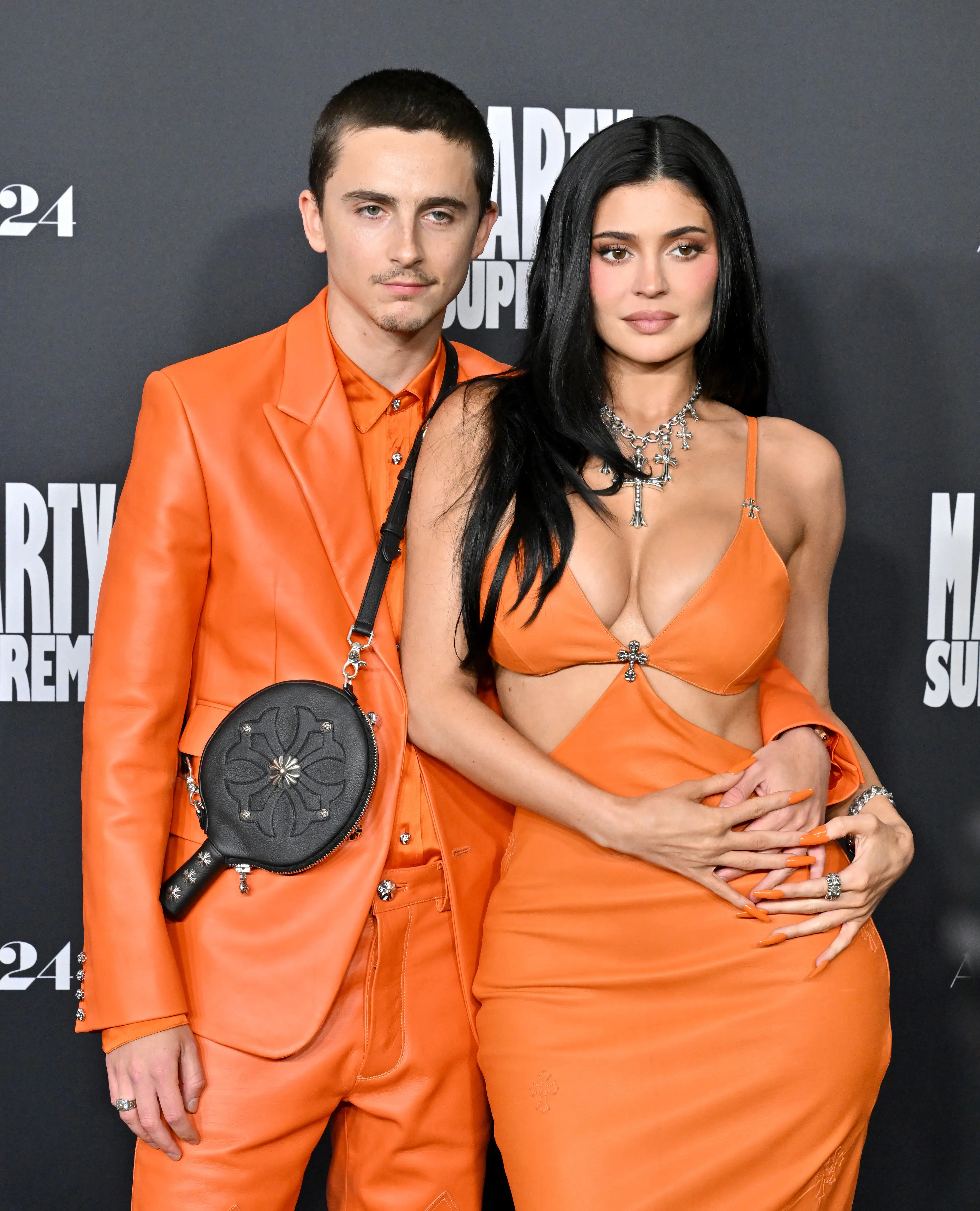 The couple rocked up in a matching orange look (Axelle/Bauer-Griffin/FilmMagic)