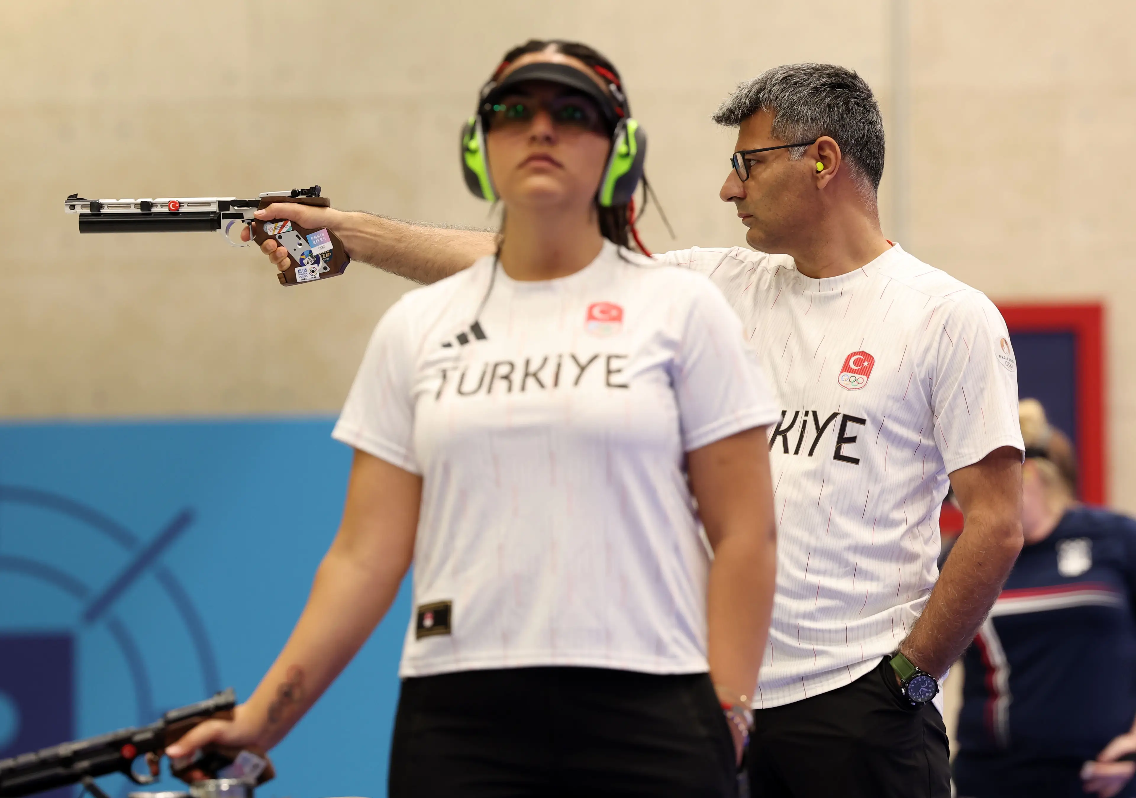 Turkey's Yusuf Dikeç used some earplugs to muffle any distracting sounds, but that was it. (Charles McQuillan/Getty Images)