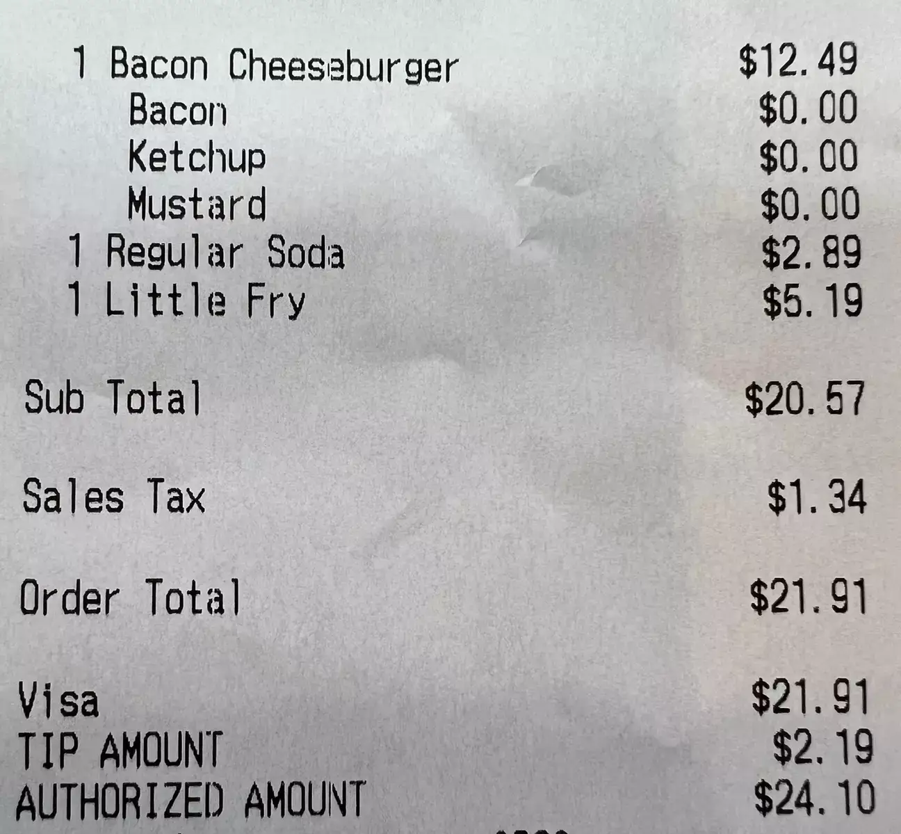 A receipt showed on social media shows just how much the burger, fries, and soda cost (Twitter/@WallStreetSilv/Reddit)