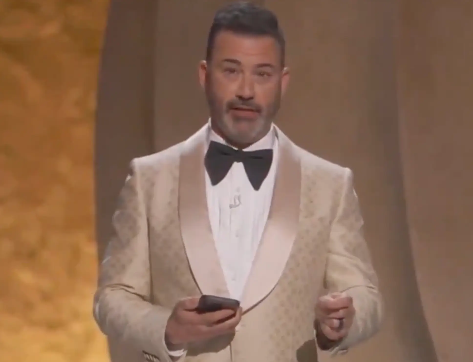 The room then erupted in laugher and cheers after Kimmel hit back at Trump.