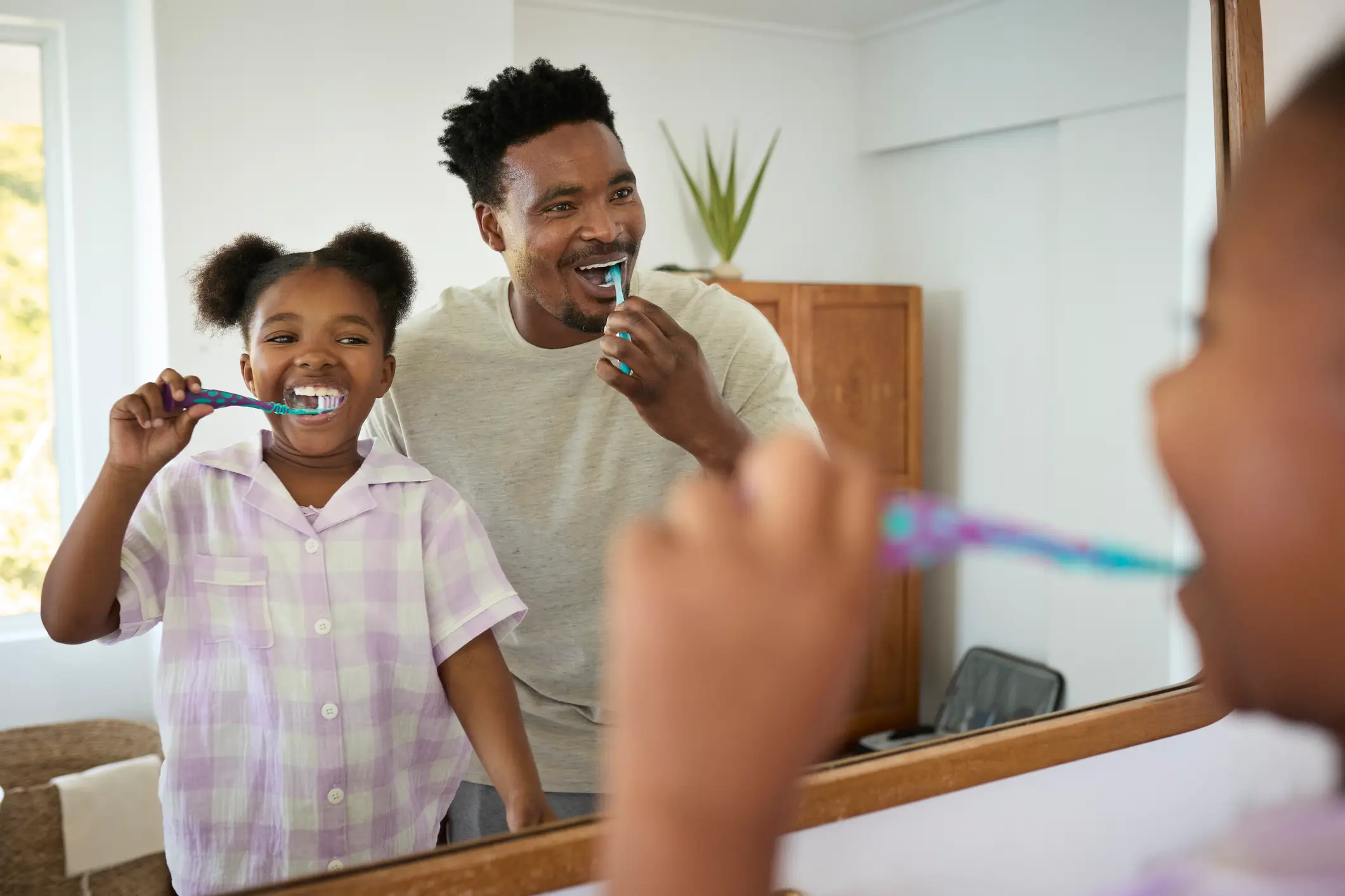 Dr Affan recommends brushing twice a day with a fluoride toothpaste, then spitting, not rinsing (Getty stock image)