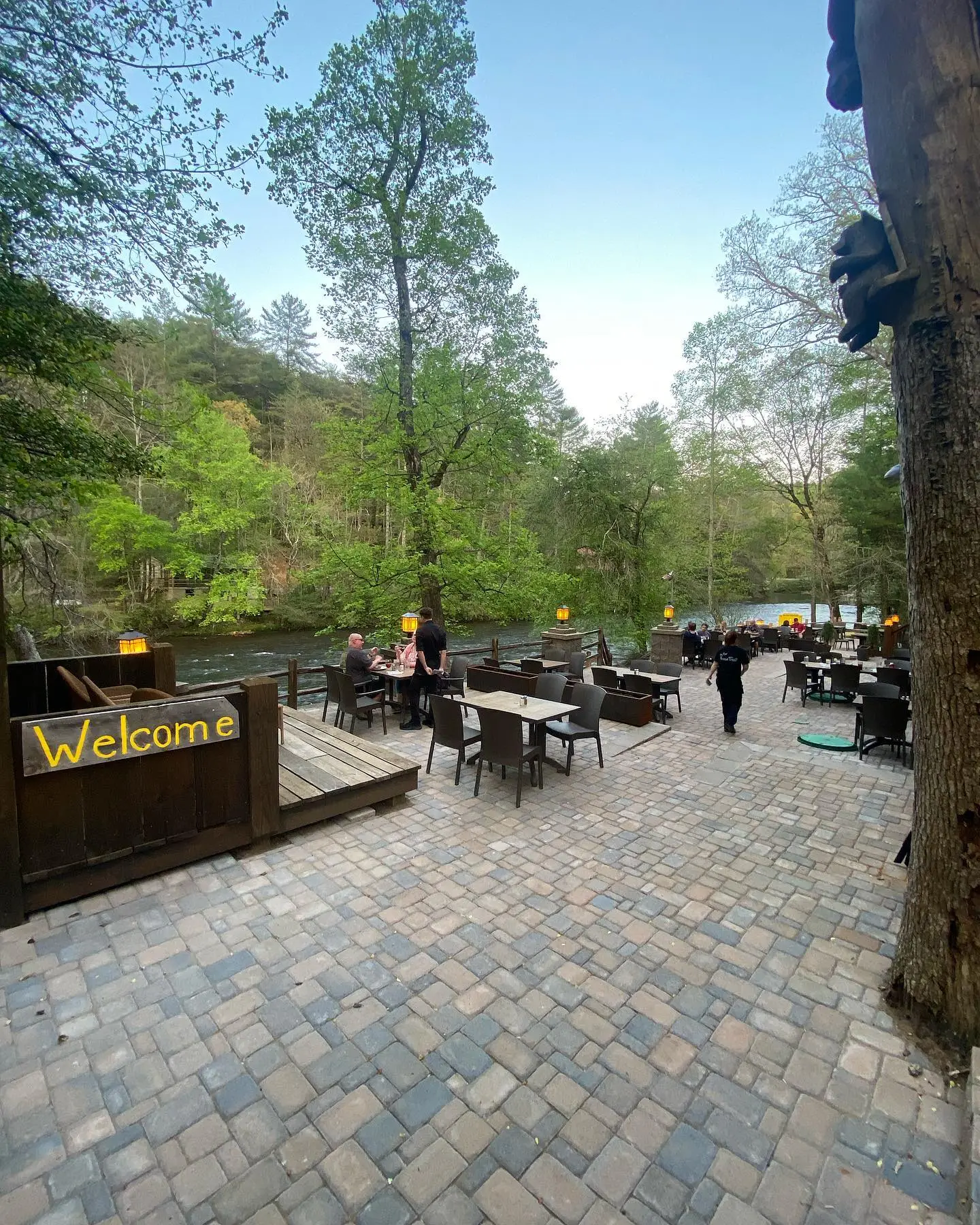 The restaurant advertises a surcharge of '$$$'.