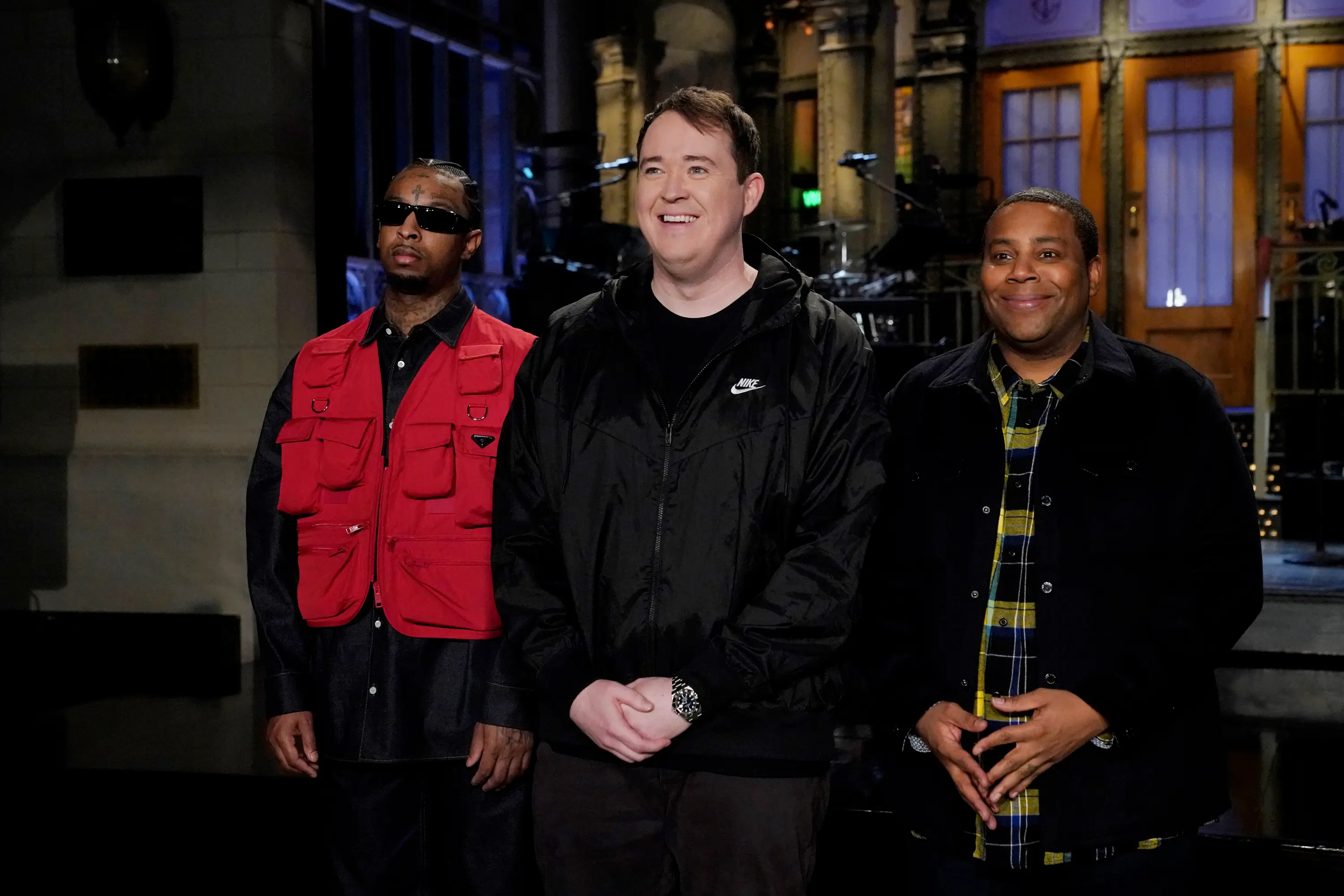 Shane Gillis pictured with 21 Savage and Kenan Thompson.