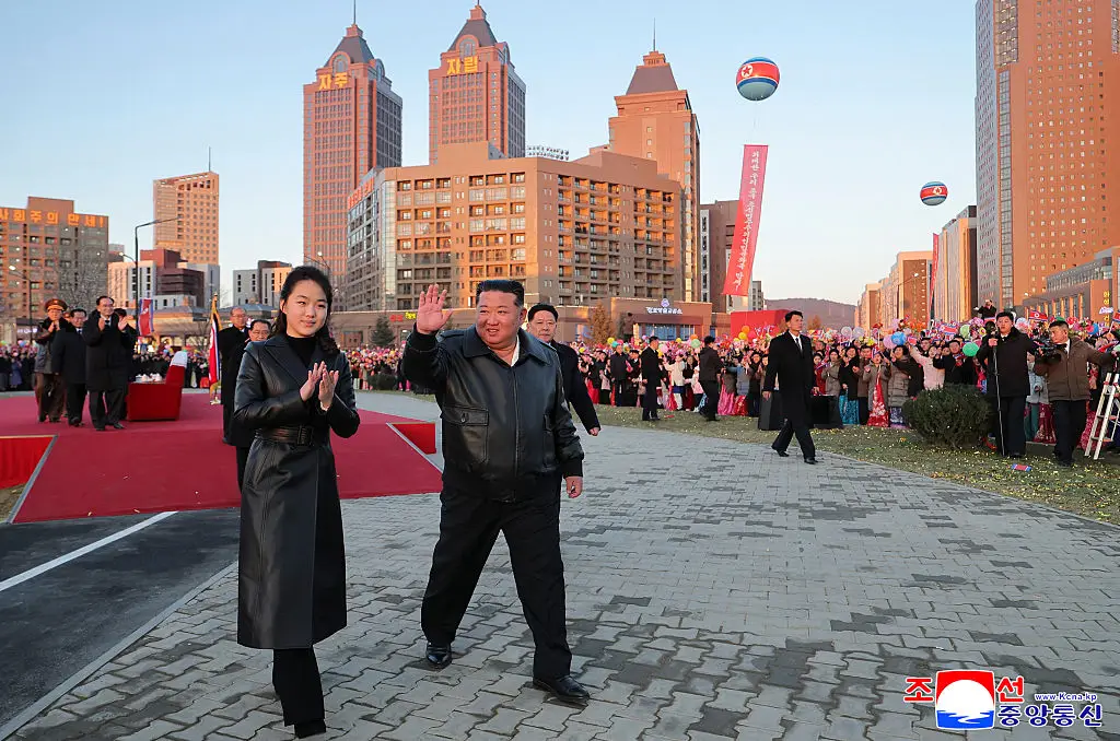 Kim appears with his daughter Kim Ju Ae (Photo by KCNA VIA KNS / AFP via Getty Images)