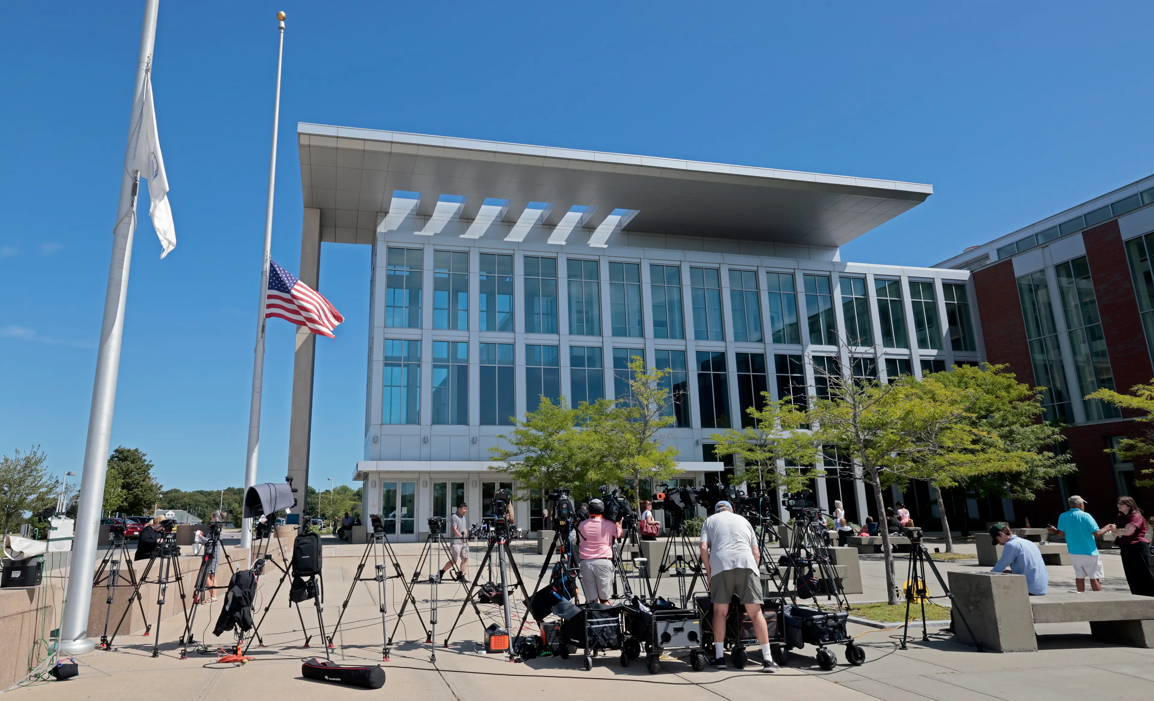 Reporters outside Plymouth Superior Court (Pat Greenhouse/The Boston Globe via Getty Images)
