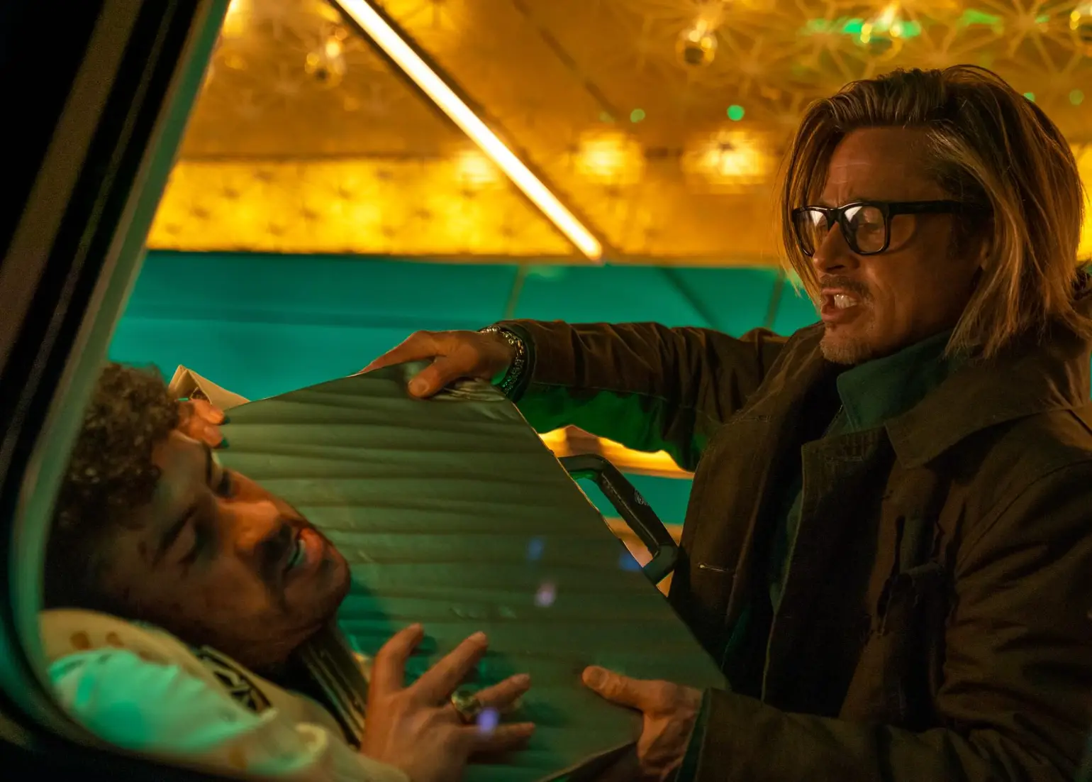 In how many films do you see Bad Bunny and Brad Pitt trade blows in a close combat fight? (Sony Pictures)