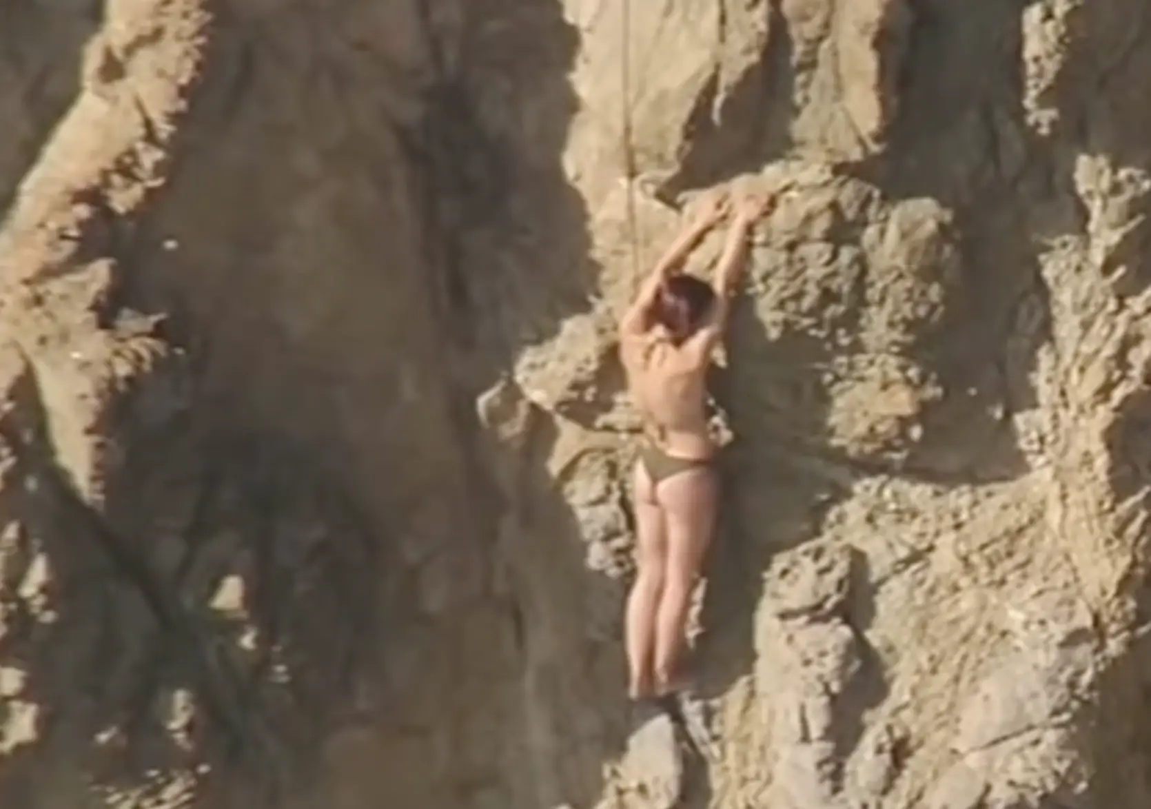 She had no choice but to cling to a rock after being swept out to sea by the strong current (ABC News)